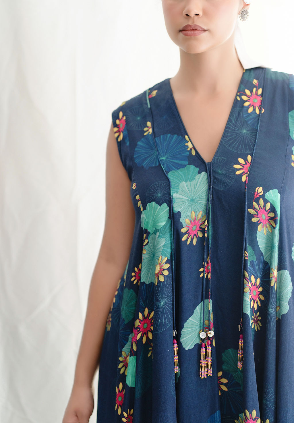 PrintedAngular panelled dress with flare, tassel detail And Pockets