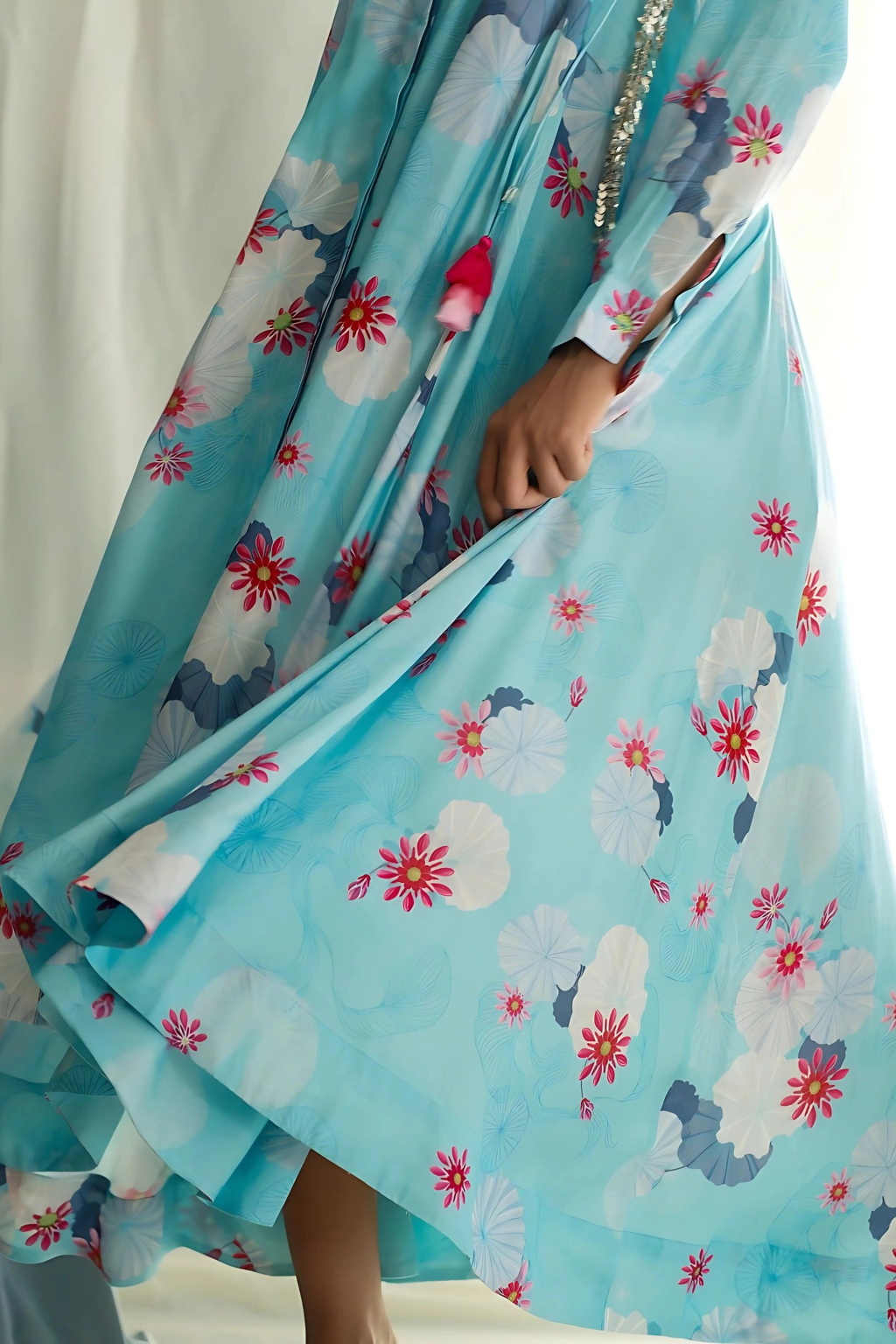 Panelled asymmetric hem dress with godet inserts for added flare