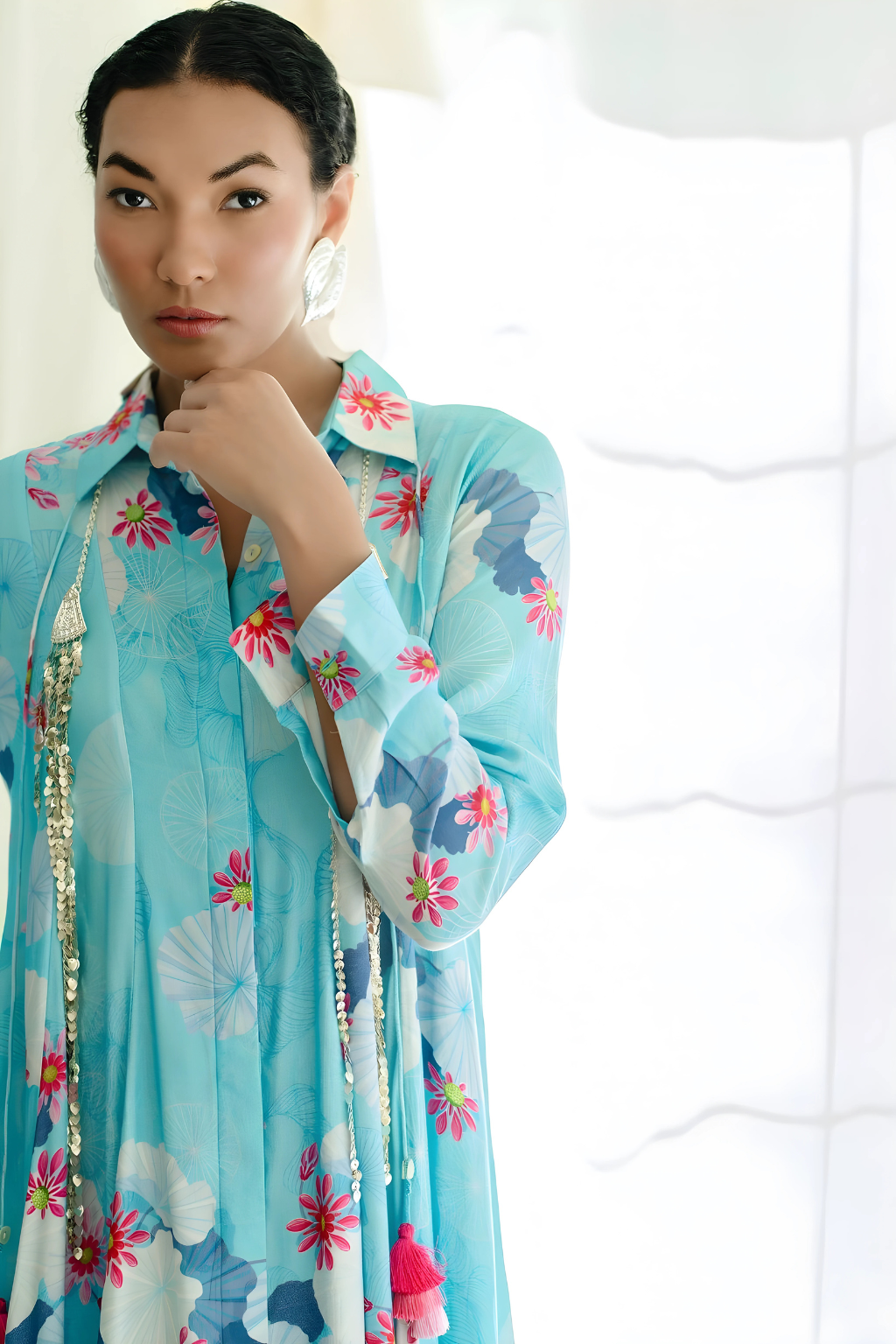 Panelled asymmetric hem dress with godet inserts for added flare