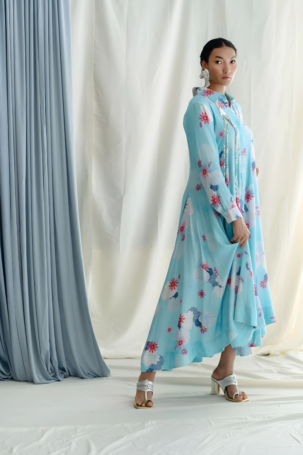 Panelled asymmetric hem dress with godet inserts for added flare