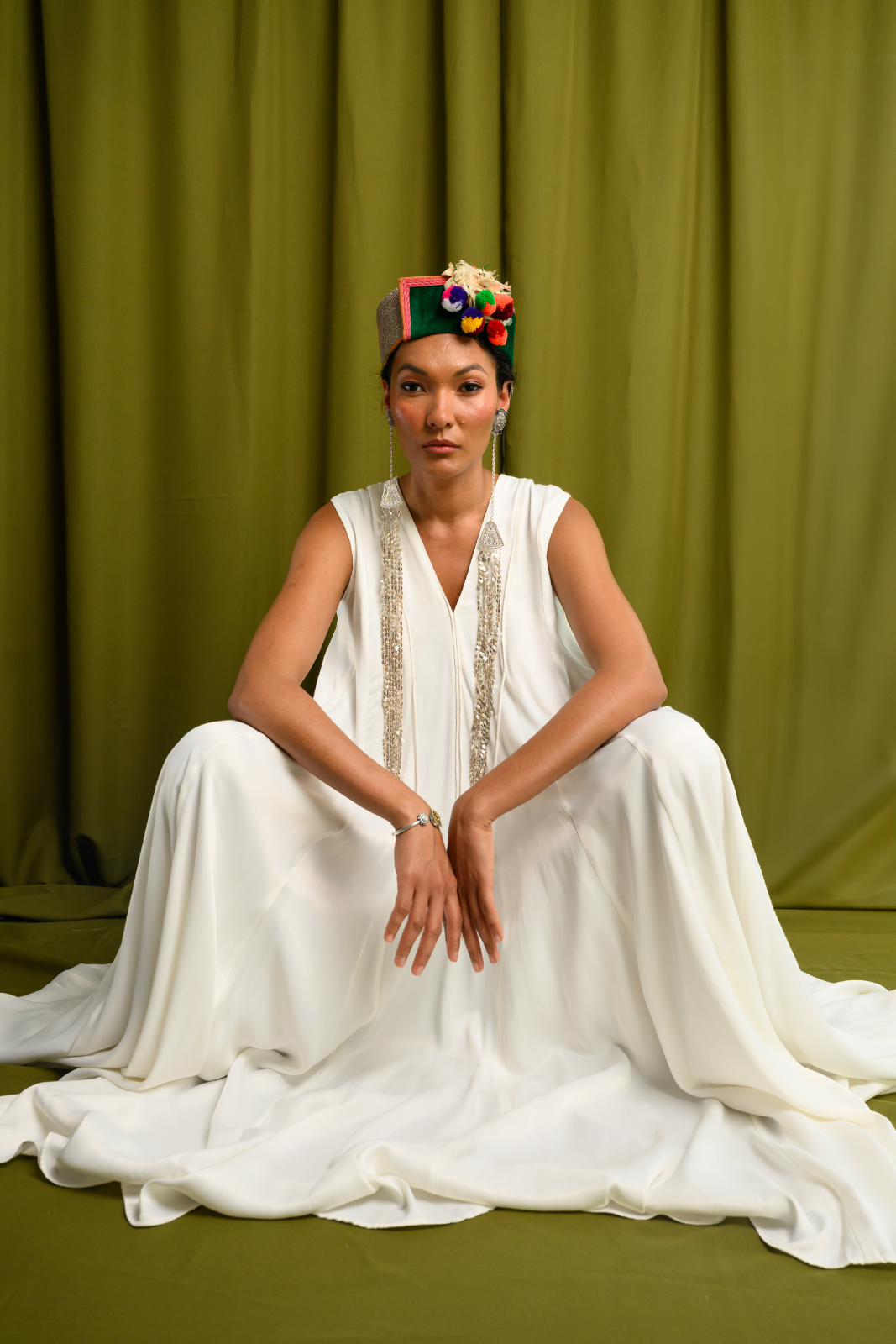 Ivory Angular Panelled Dress With Flare, tassel Detail And Pockets