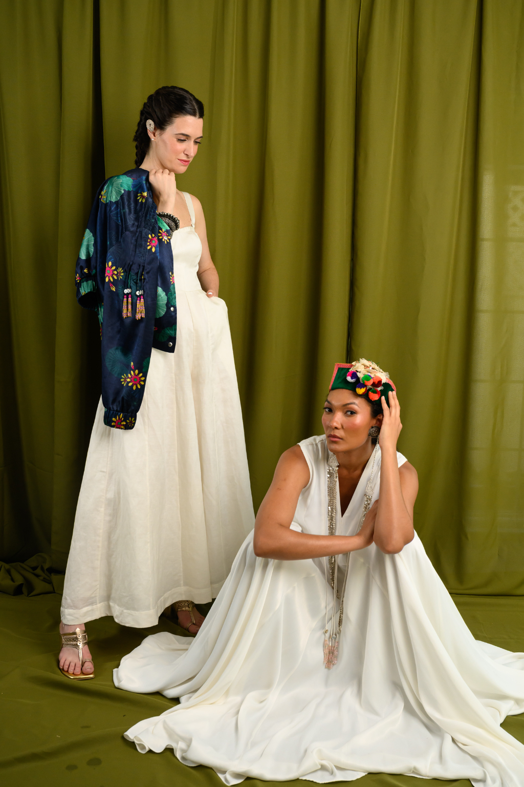 Ivory Angular Panelled Dress With Flare, tassel Detail And Pockets