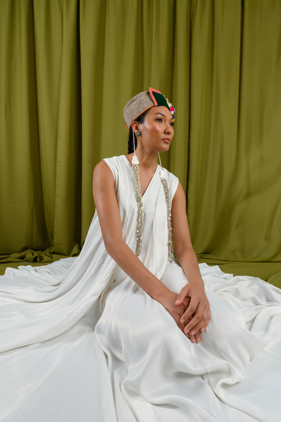 Ivory Angular Panelled Dress With Flare, tassel Detail And Pockets