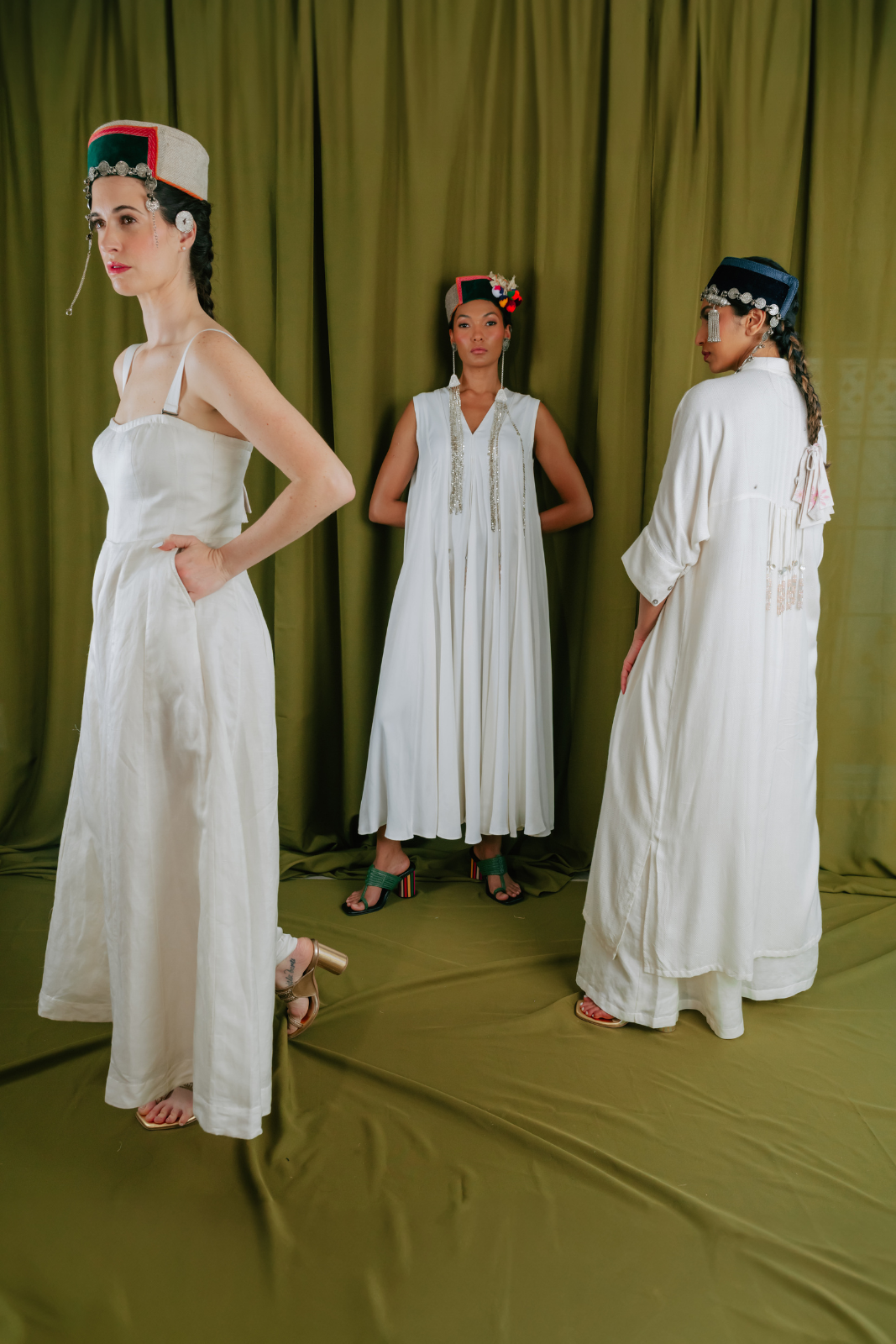 Ivory Angular Panelled Dress With Flare, tassel Detail And Pockets