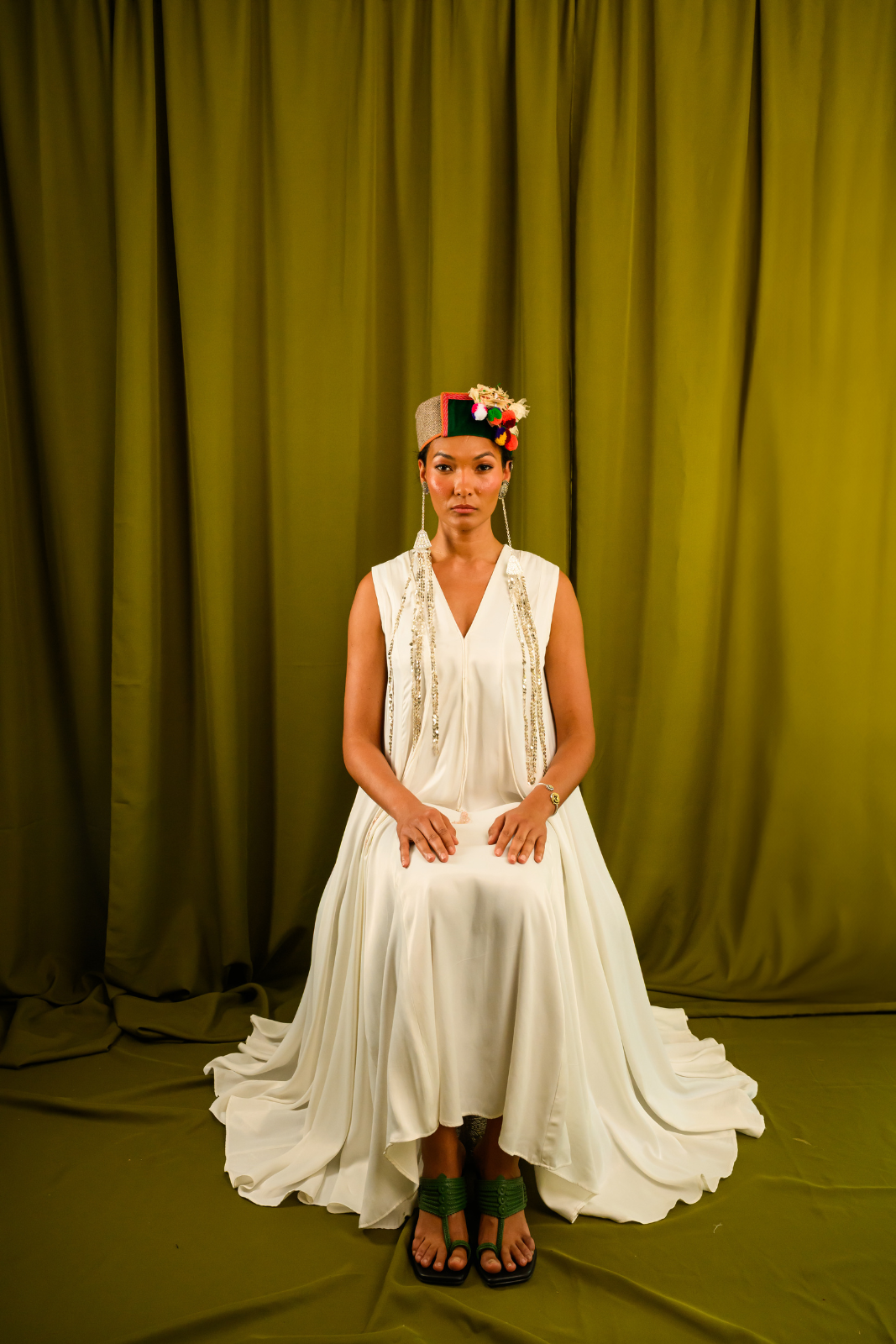 Ivory Angular Panelled Dress With Flare, tassel Detail And Pockets